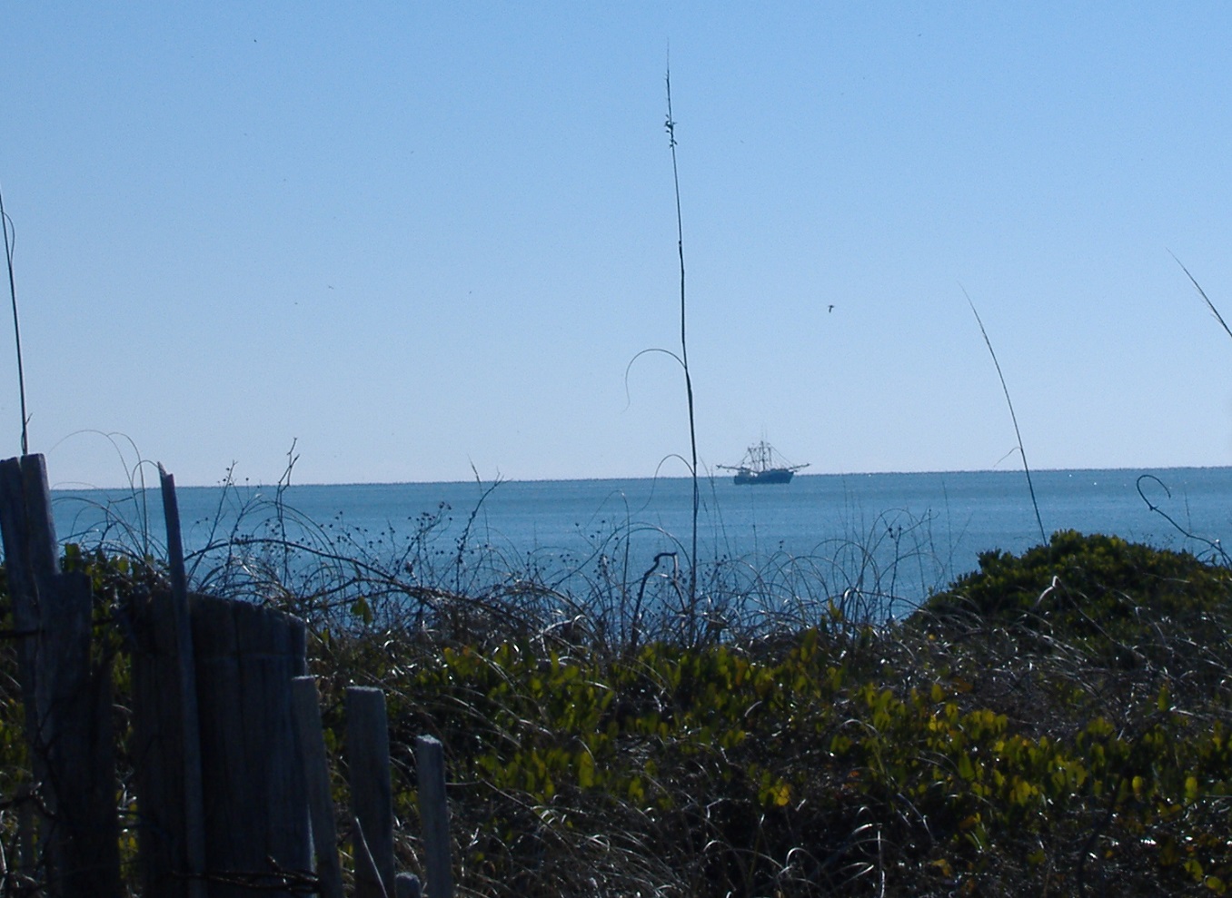 Oak Island NC photo fishing boat on the ocean